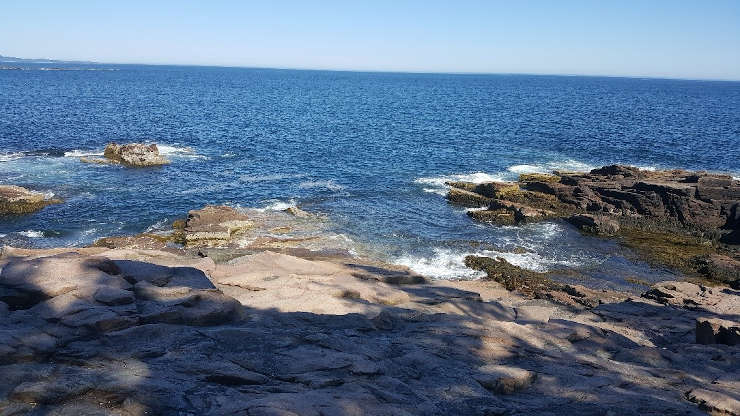 Sitting on a rock on the coast of Maine, I was in total astonishment of the vastness and grandeur of the ocean.