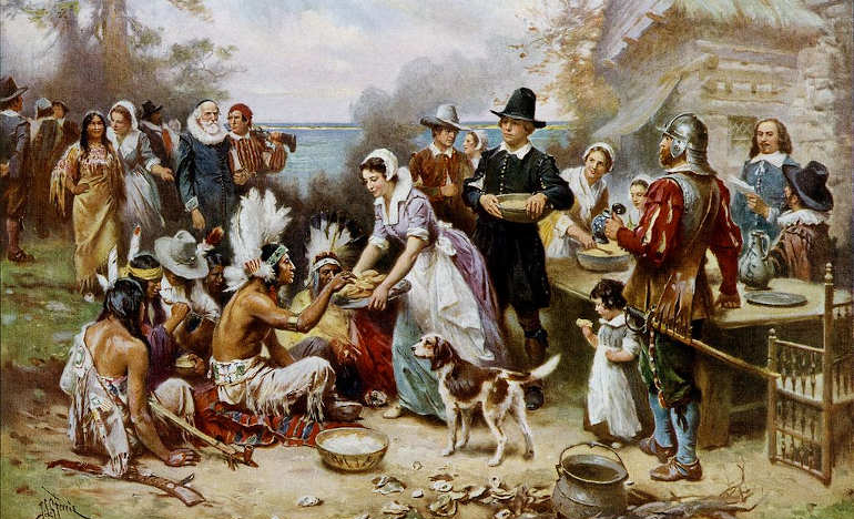“The First Thanksgiving, 1621” was painted by Jean Leon Jerome Ferris between 1912 and 1915. Historians note that the scene depicted here is not historically accurate. The clothing worn by the Pilgrims is incorrect, the Wampanoag did not wear feathered war bonnets, nor would they have been sitting on the ground.